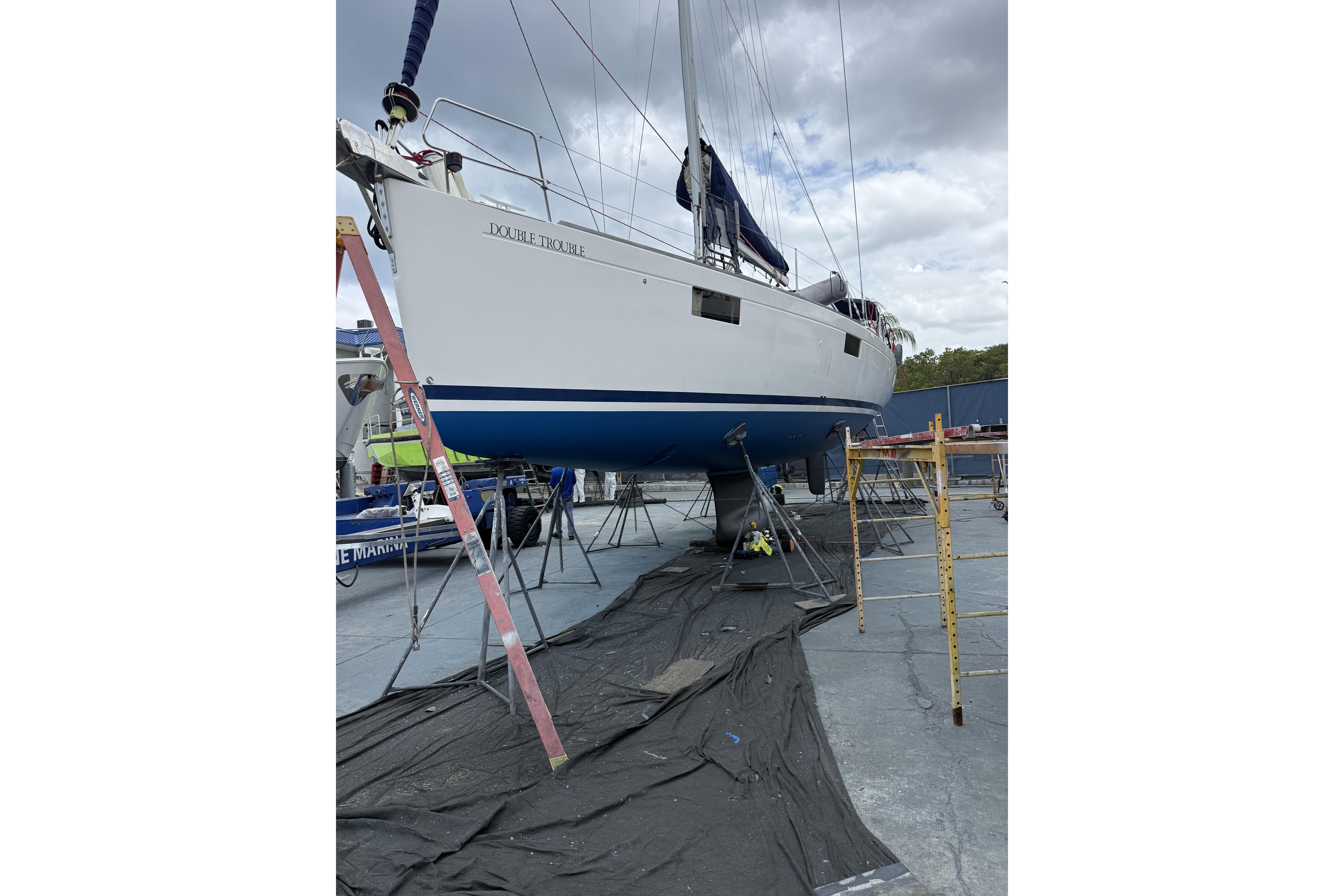 2017 Beneteau Oceanis 48 sailboat on dry dock, undergoing maintenance.