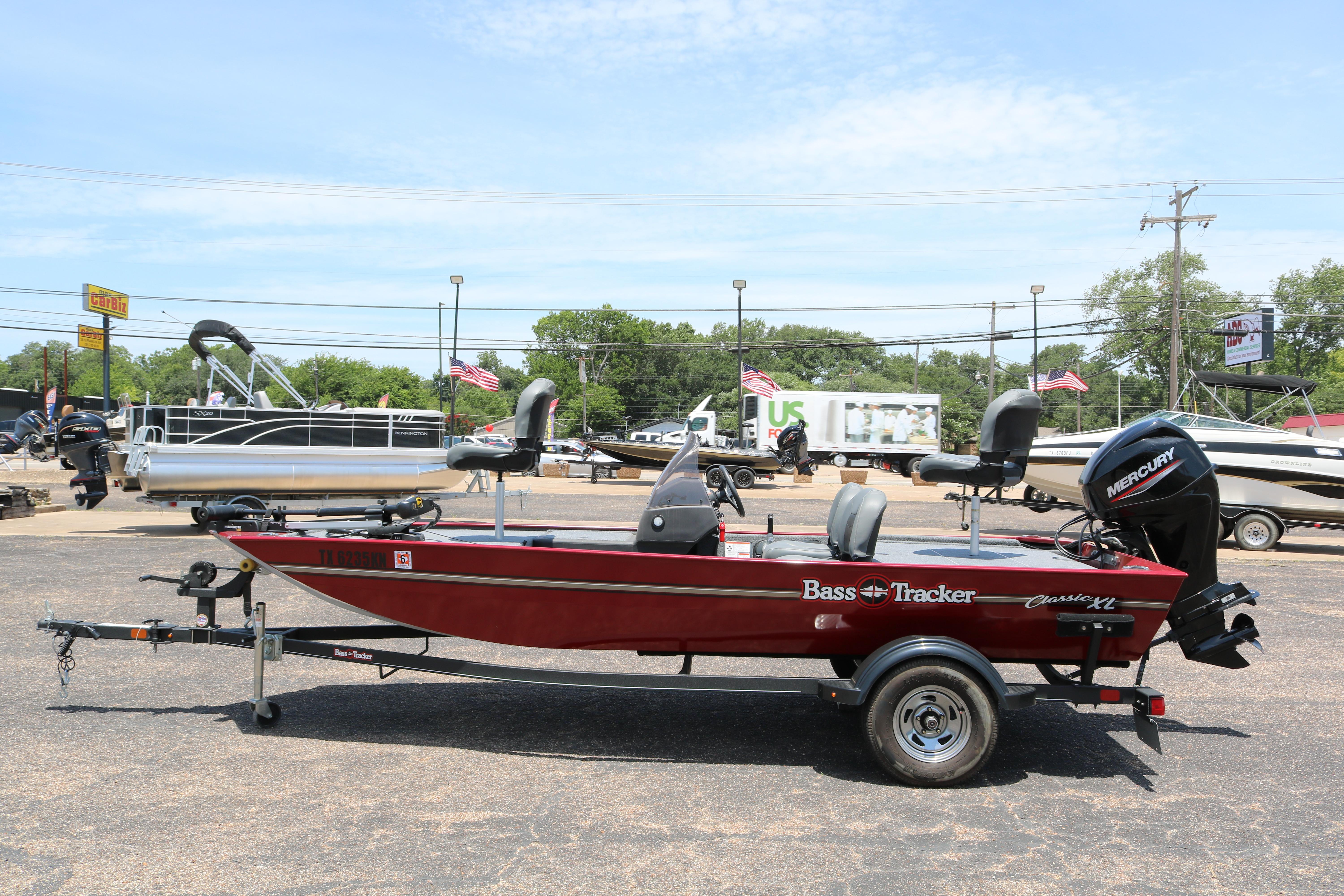 2021 Tracker Bass Tracker Classic XL boat on trailer in outdoor dealership lot.