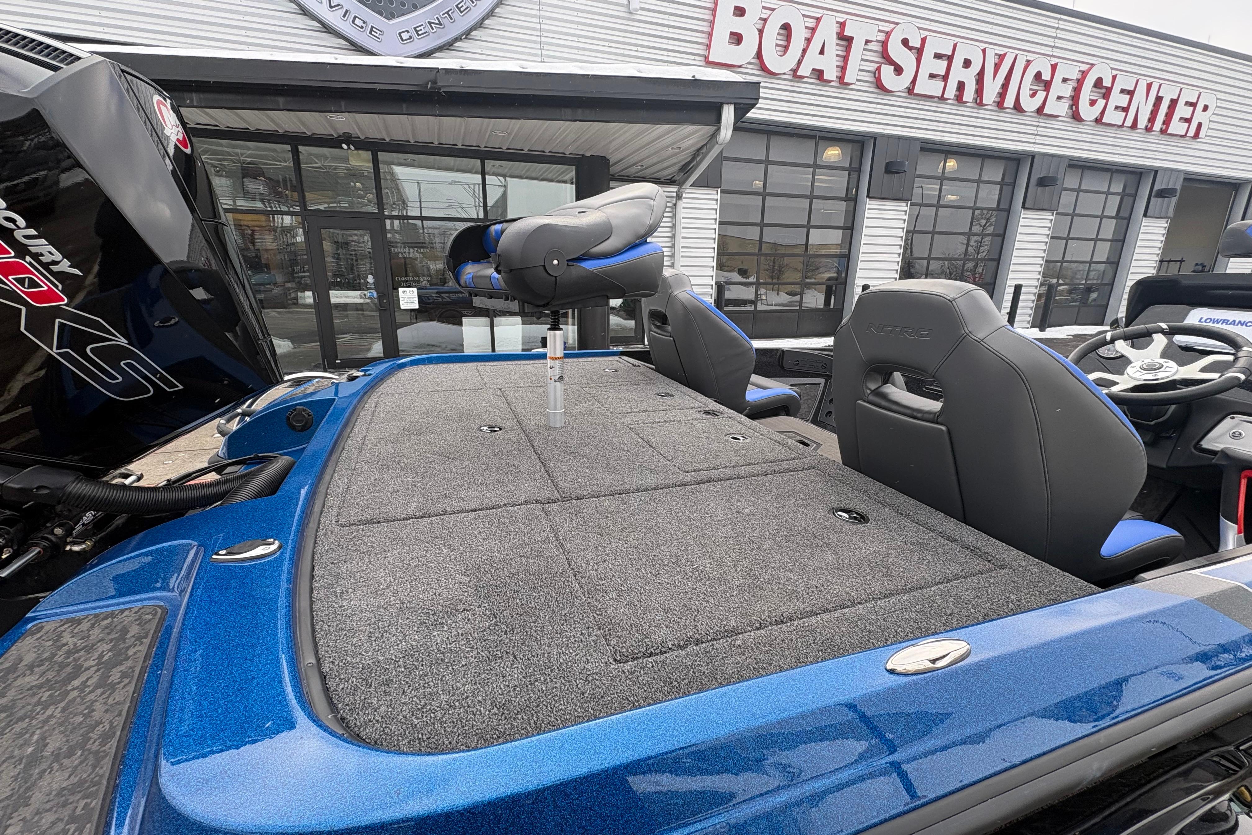 2026 Nitro Z20 XL boat at service center, featuring spacious deck and modern seating.