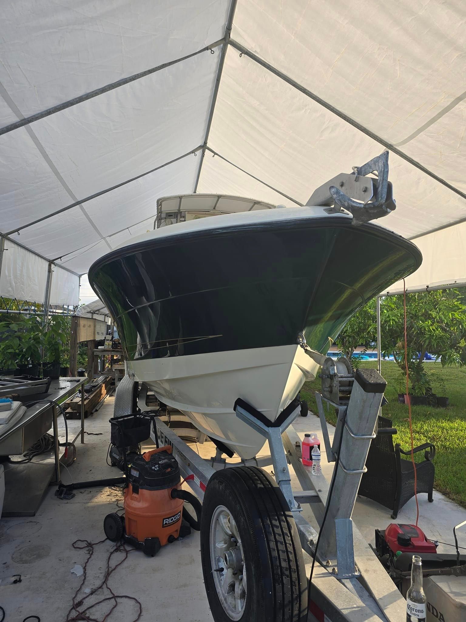 2005 Hydra-Sports Vector 2800 CC on trailer under tent.