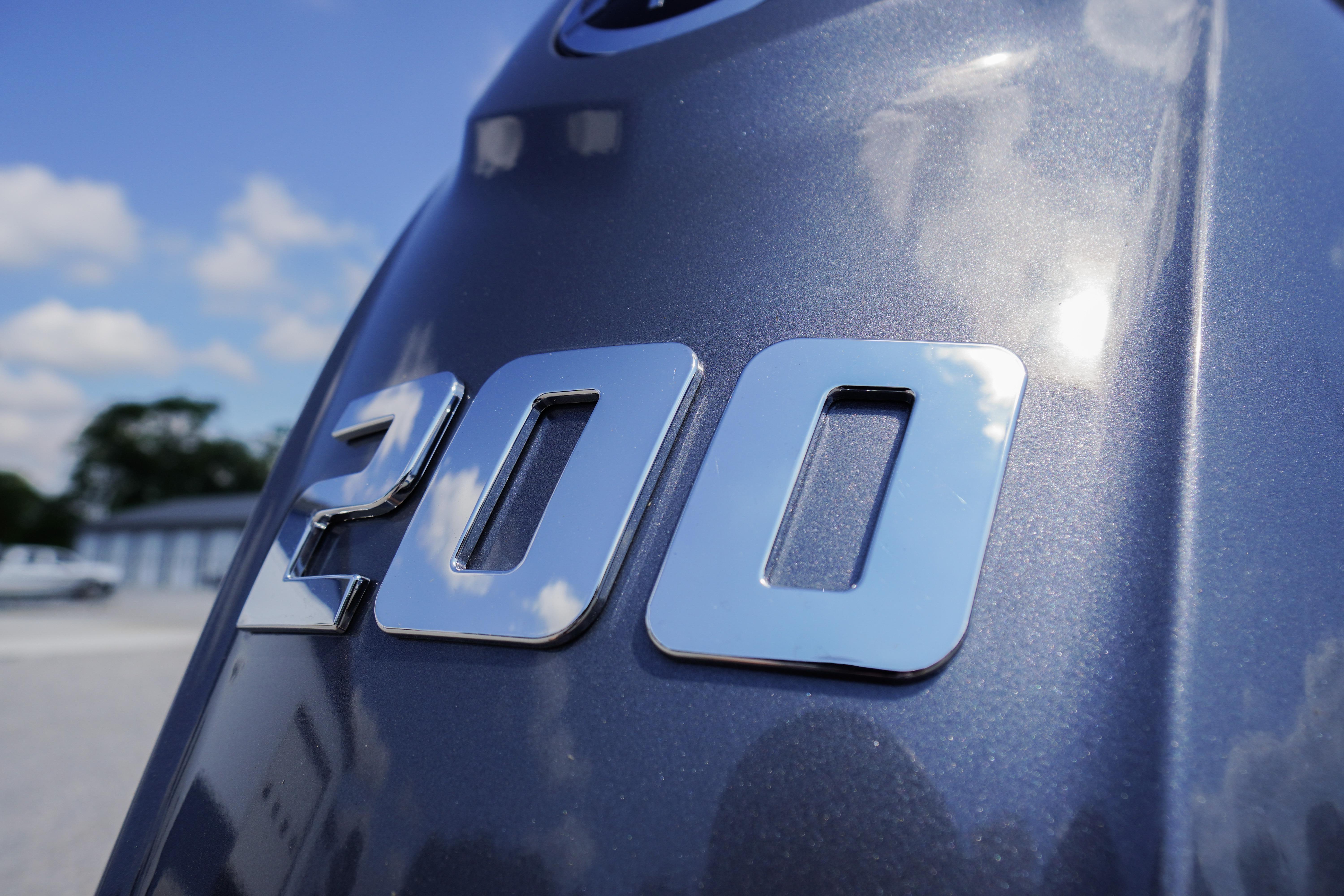Close-up of metallic "200" emblem on Tidewater 220 CC Adventure, 2026 model.