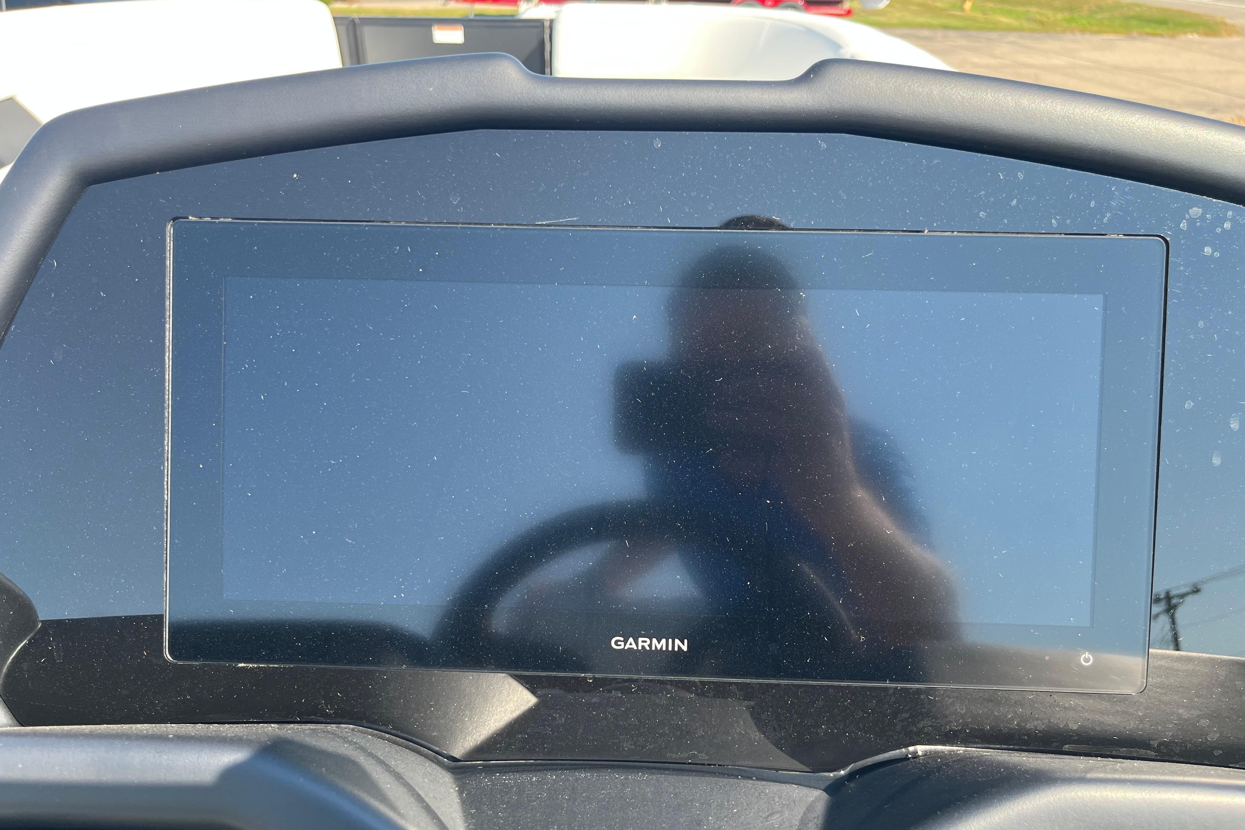 Dashboard of 2026 Evotti 725CS featuring a Garmin display screen.