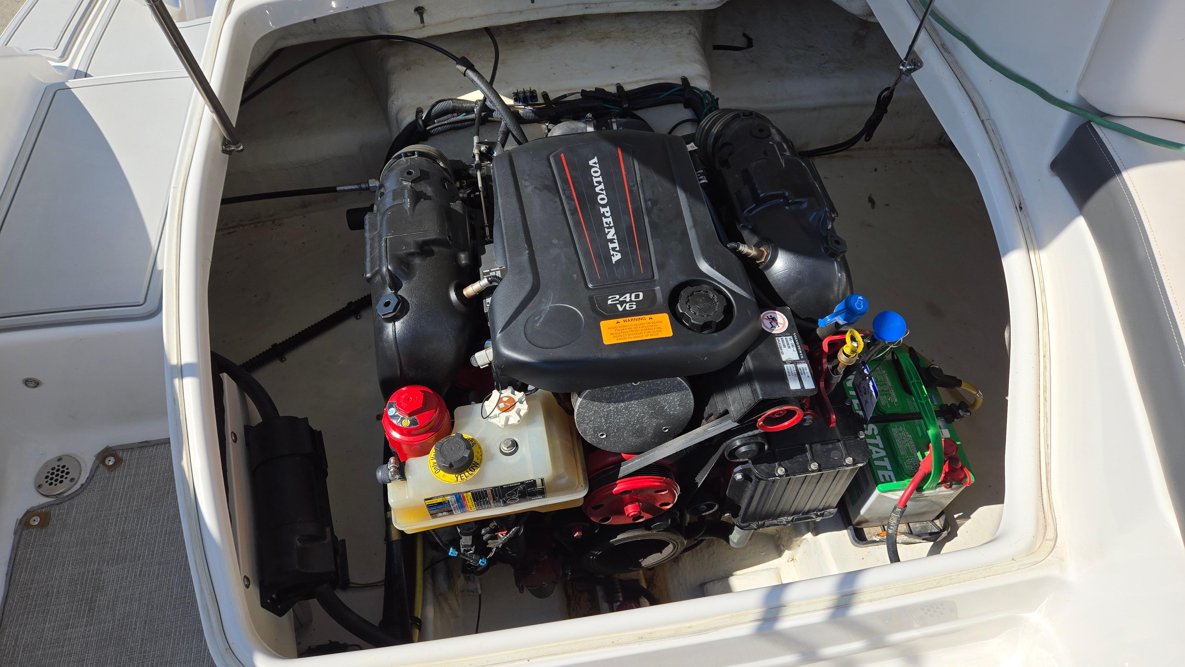 Engine compartment of 2018 Chaparral 224 Sunesta boat, featuring Volvo Penta V6 engine.
