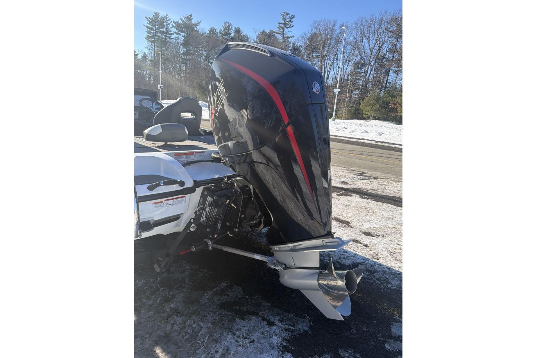 2026 Nitro Z19 XL Pro boat with powerful outboard motor in snowy setting.