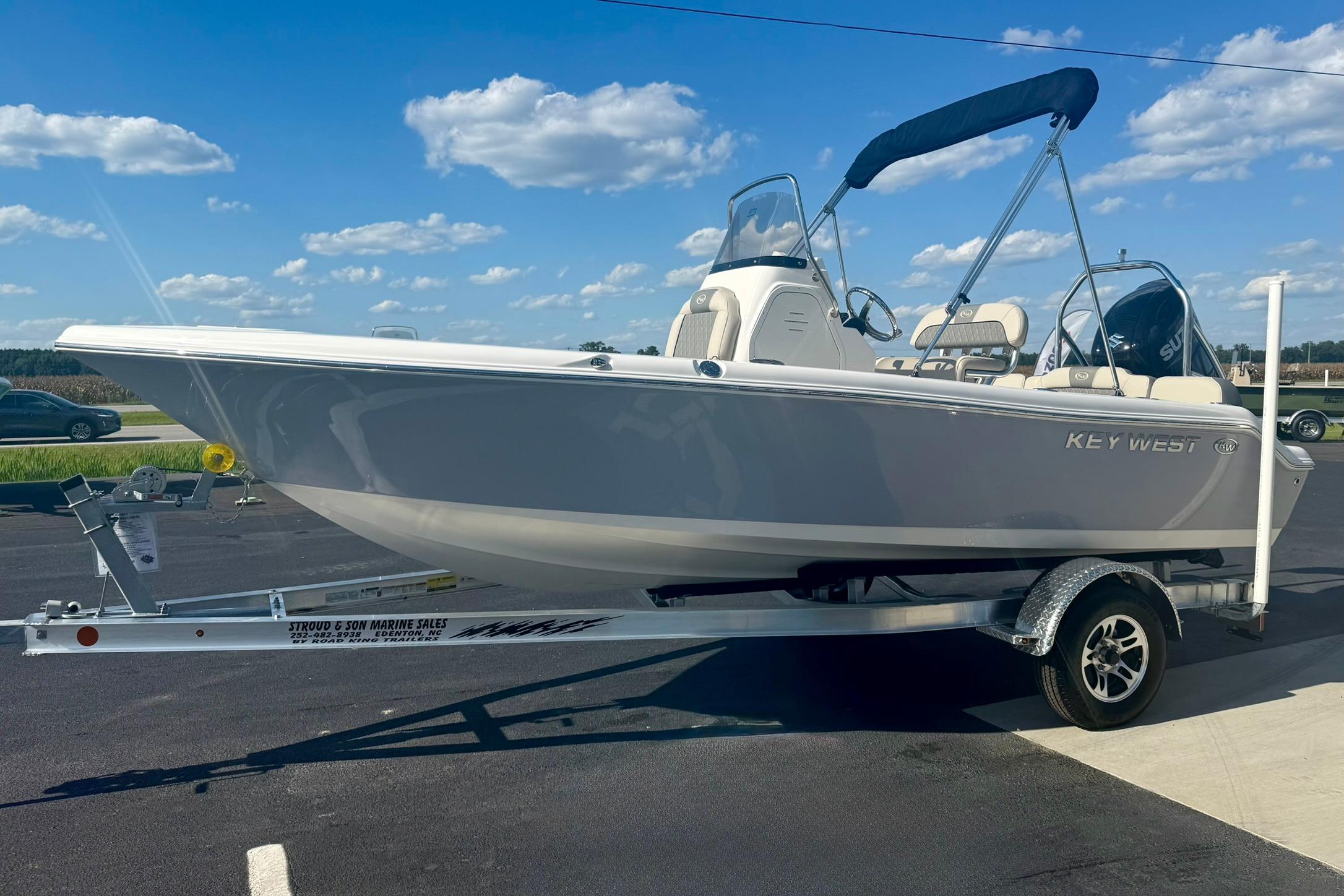 2026 Key West 189 FS boat on trailer under clear blue sky.