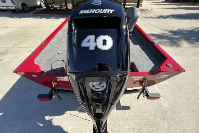 2025 Tracker Super Guide V-16 T boat with Mercury 40 engine, rear view.