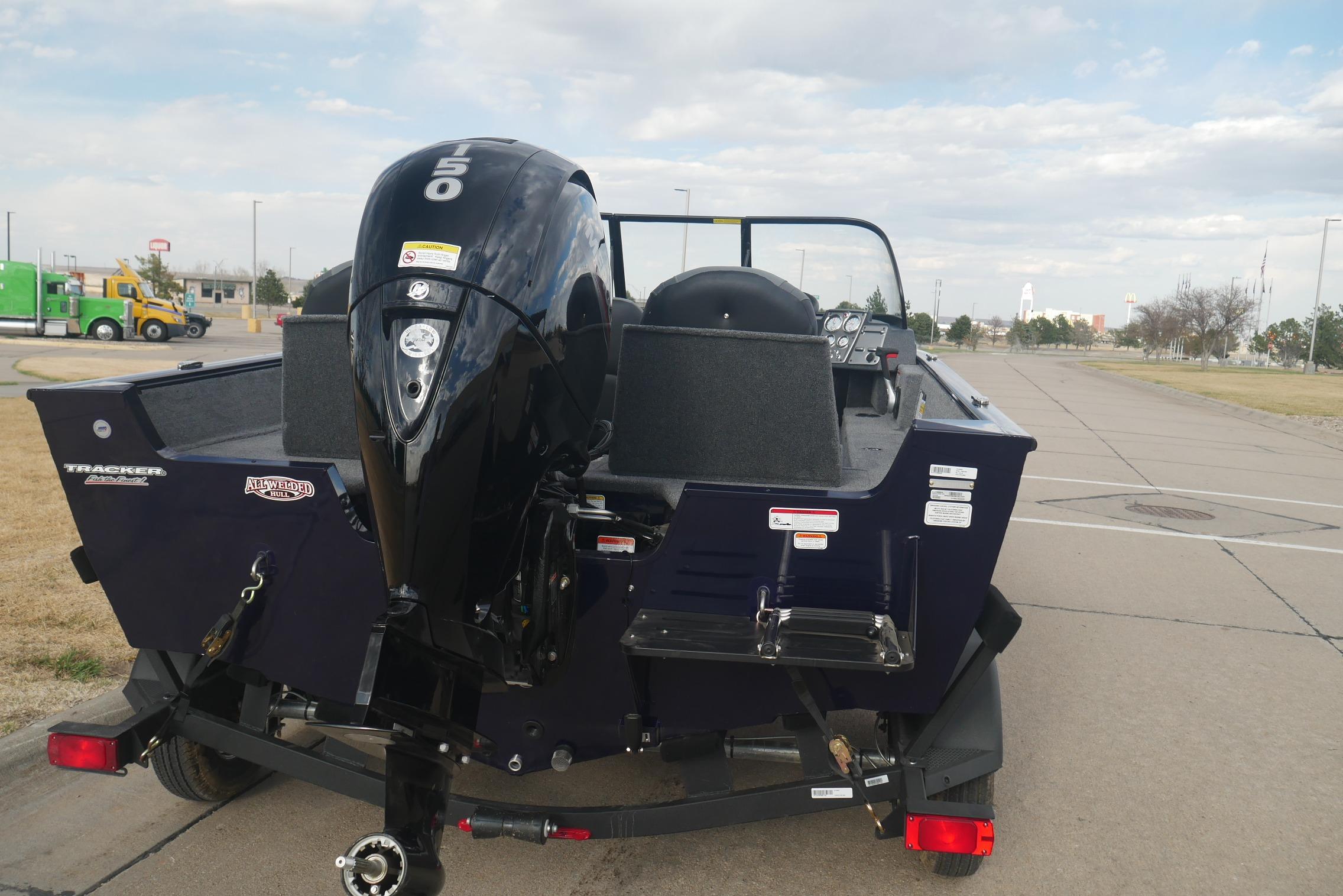 2026 Tracker Pro Guide V-175 Combo boat with powerful outboard motor on trailer.