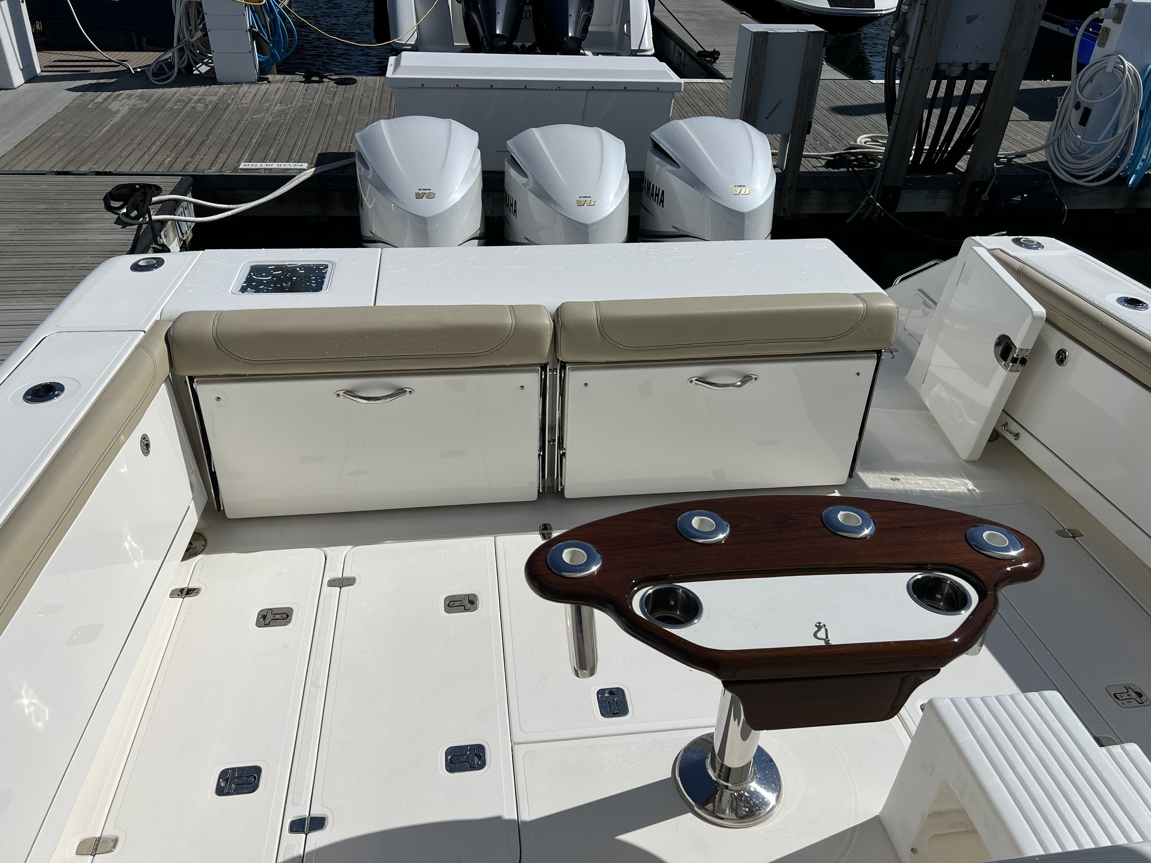2021 Pursuit OS 385 Offshore with luxurious cockpit and triple engines.