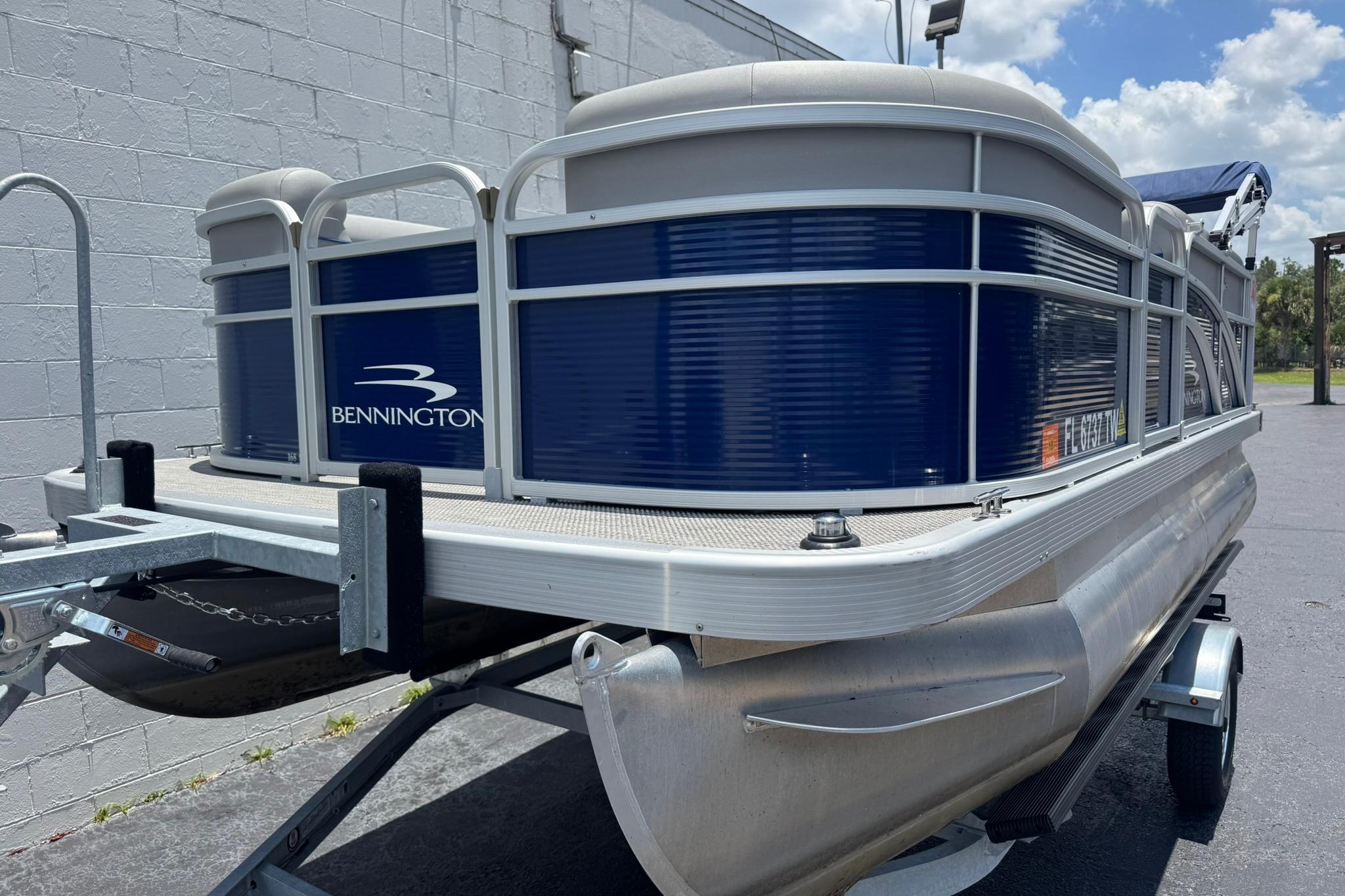 2024 Bennington SV 168 SLV 8' Narrow Beam pontoon boat on trailer.
