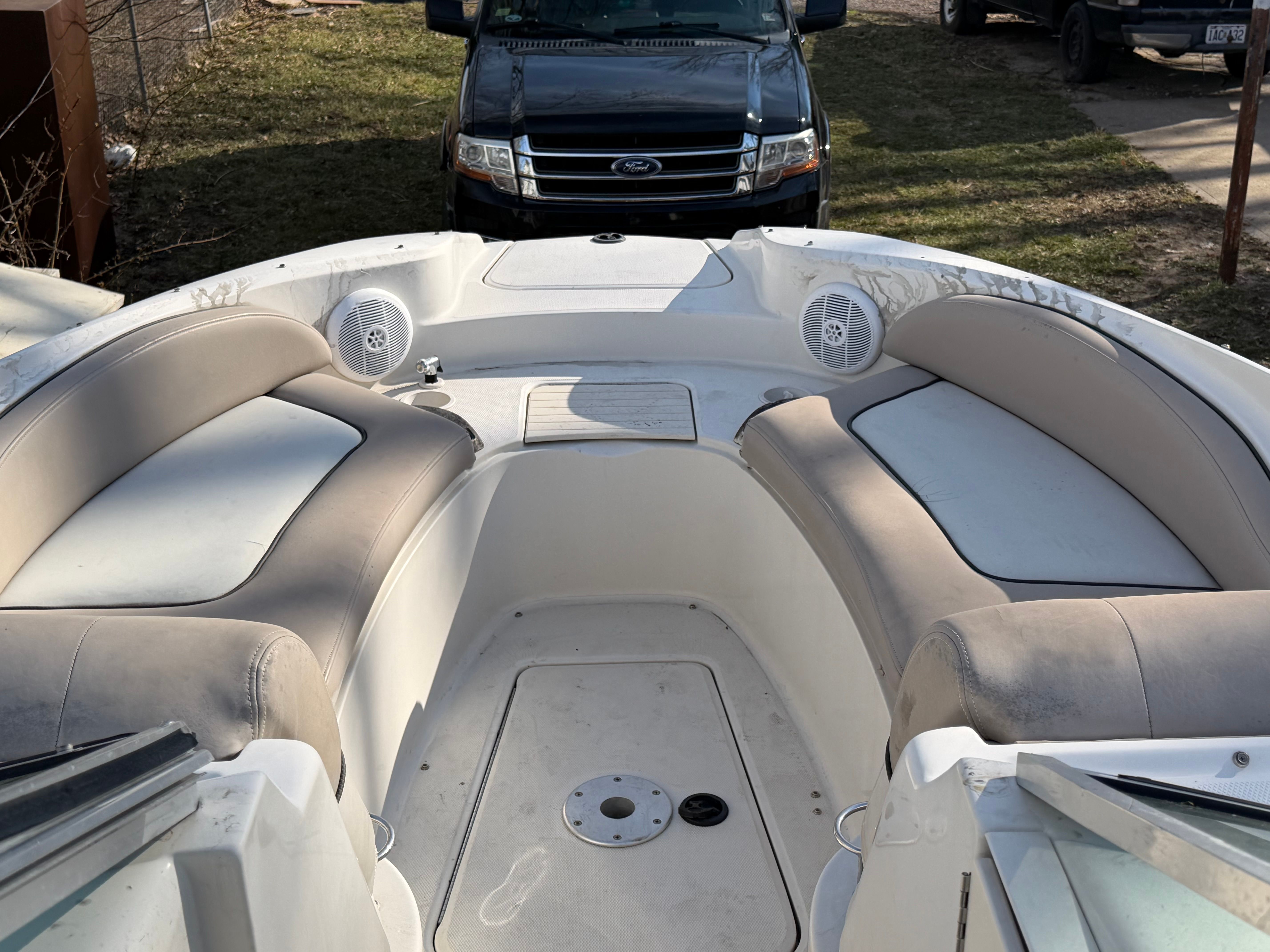 Interior of a 2004 Sea Ray 270 Sundeck boat with seating area.