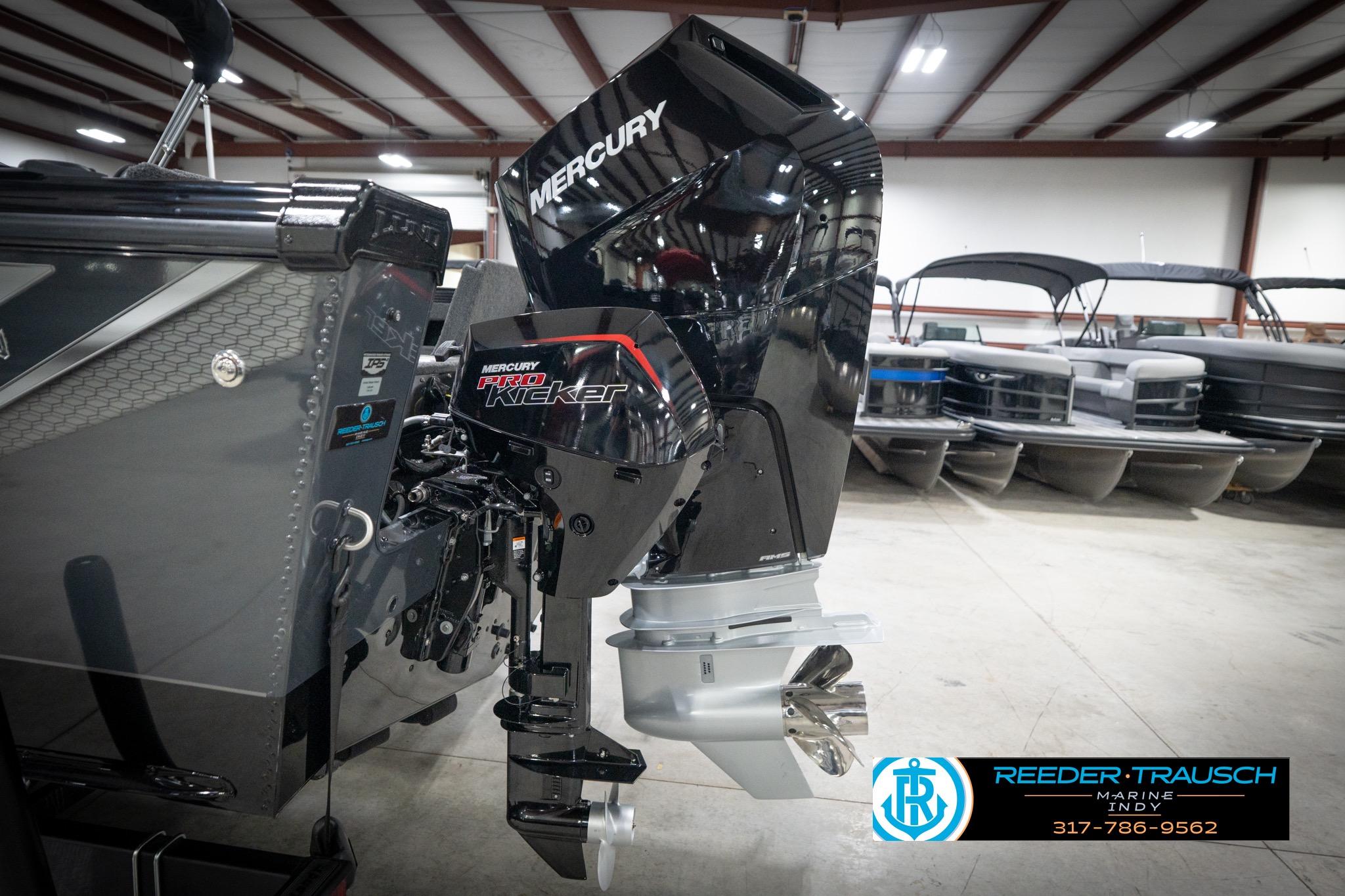 2026 Lund 2275 Baron with Mercury Pro Kicker engine in showroom.