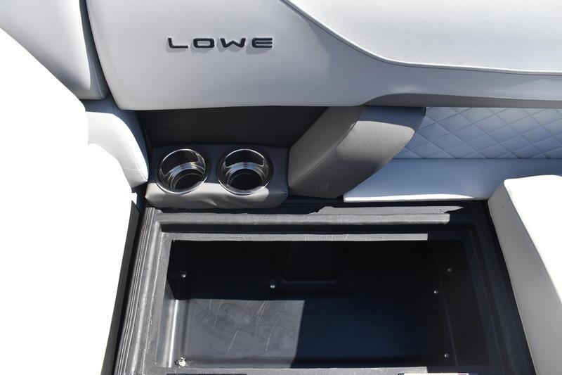 Interior of 2026 Lowe SS 230 boat with cup holders and storage compartment.