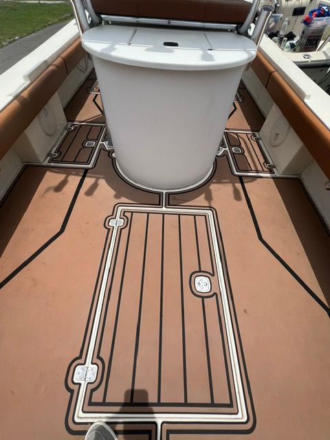 Interior of a 2007 Dorado 30 boat with modern flooring.