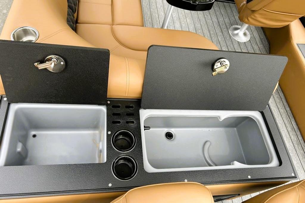 2026 Ranger 220FC boat interior with storage compartments and cup holders.