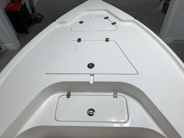 2026 Key West 188 Bay Reef boat deck with storage compartments.