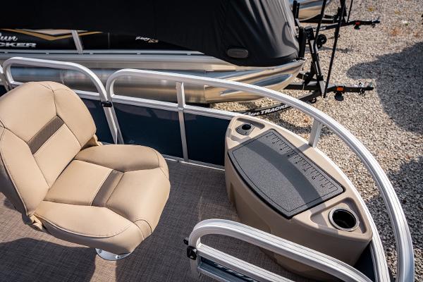 2025 Sun Tracker BASS BUGGY 18 pontoon boat interior with seating and control panel.