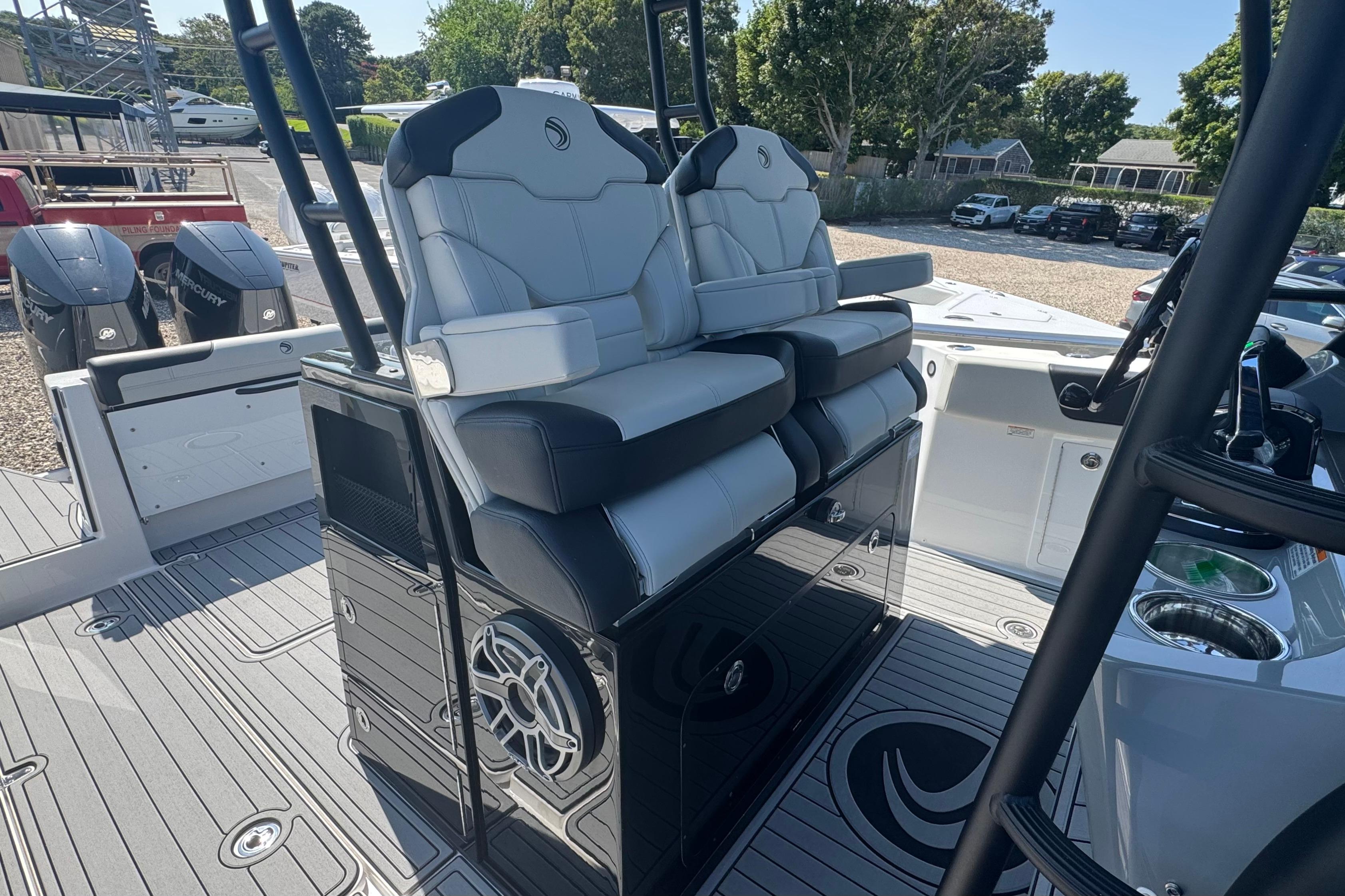 2025 Edgewater 340CC boat interior with dual seats and modern design.