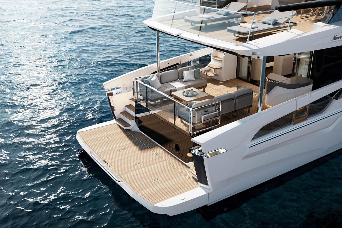 Luxurious 2026 Absolute Navetta 66 yacht with elegant deck and modern seating on the ocean.