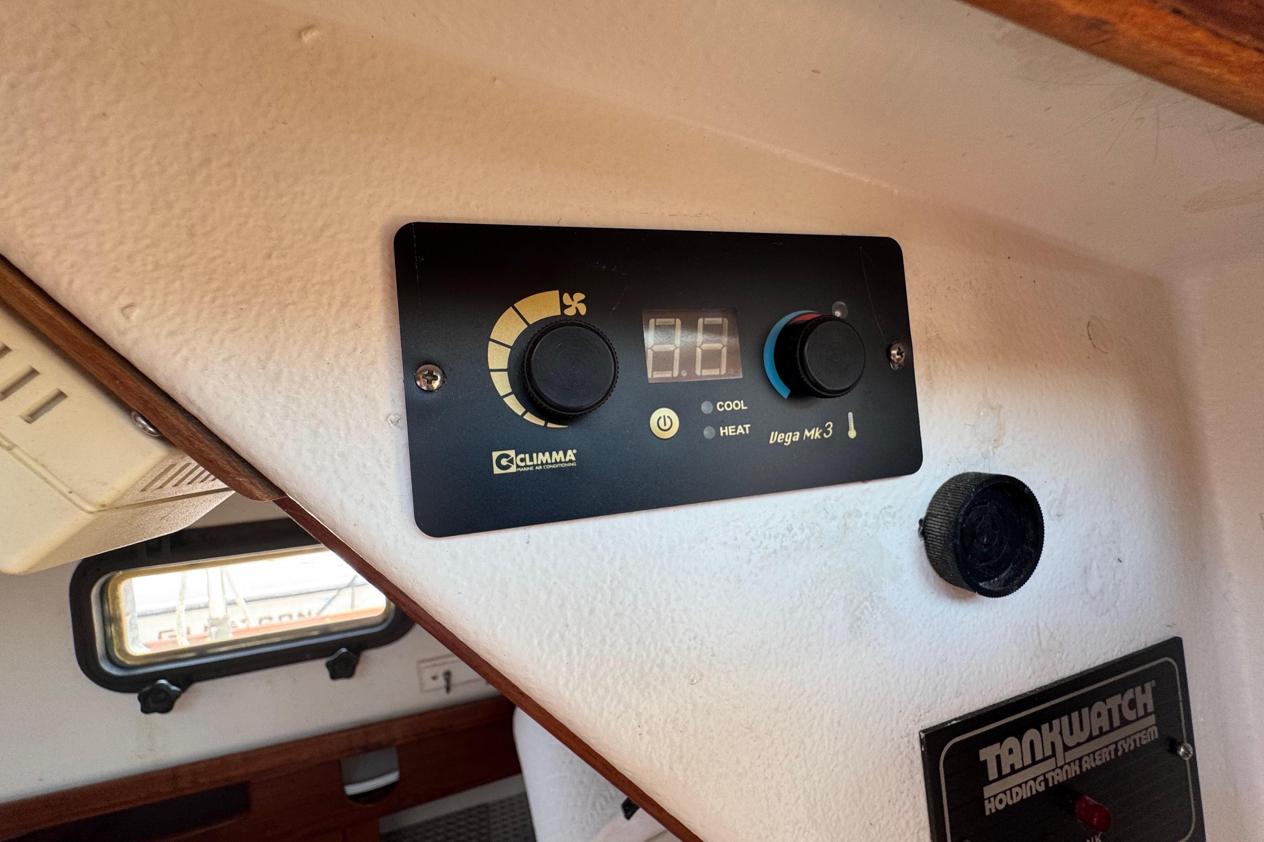 Control panel inside 1989 Cape Dory 30 Motorsailer, featuring Clima Vega Mk3 system.