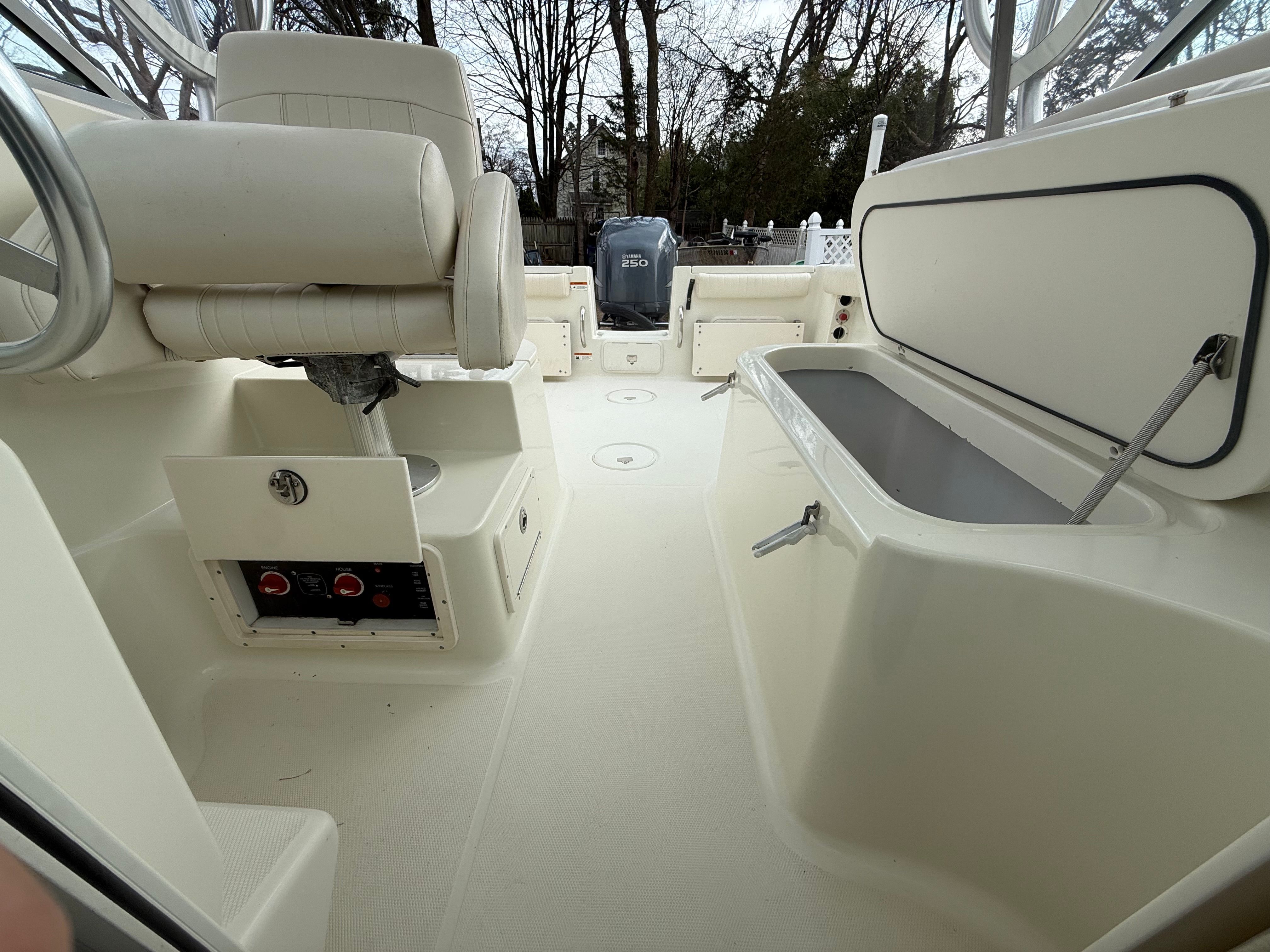 Interior of a 2008 Hydra-Sports Vector 2200 VX boat, featuring seating and storage.