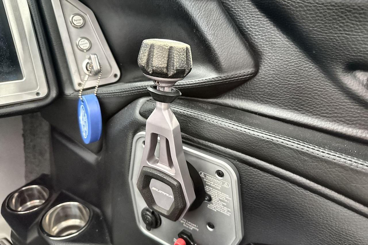 Interior of a 2021 Supra SE 550 featuring a control lever and dashboard details.