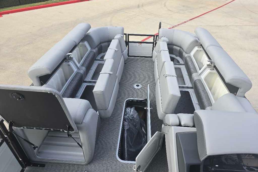 2025 Regency 250 LE3 Sport pontoon boat with spacious seating and storage compartments.