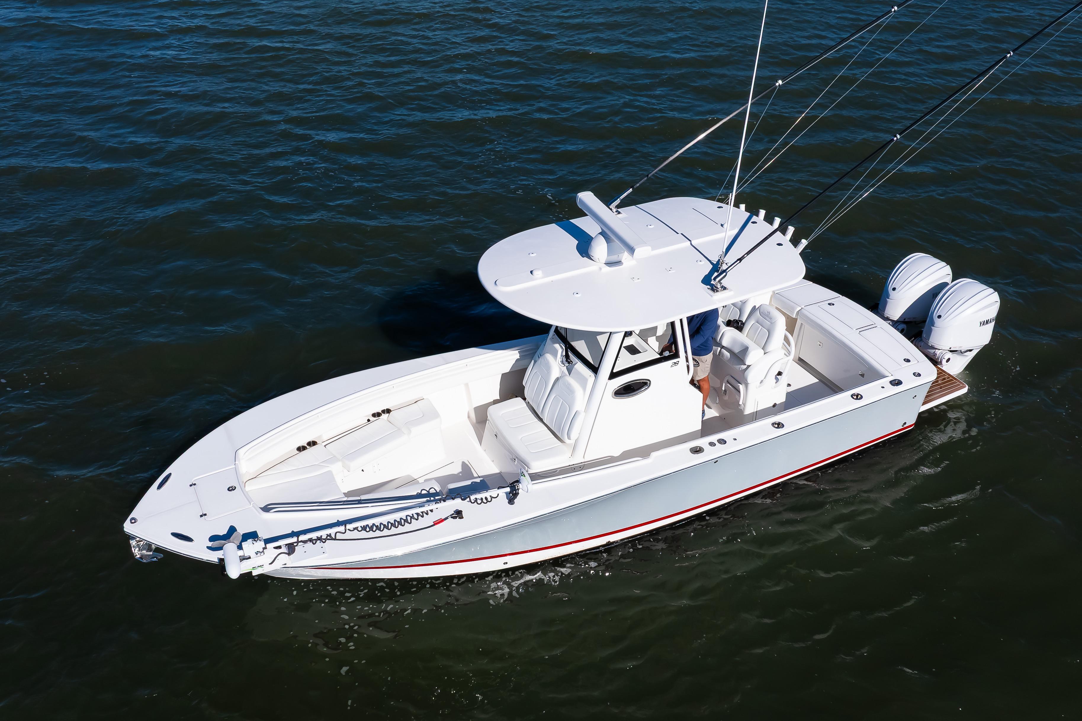 2022 Regulator 28 Forward Seating boat on water, featuring dual outboard engines.
