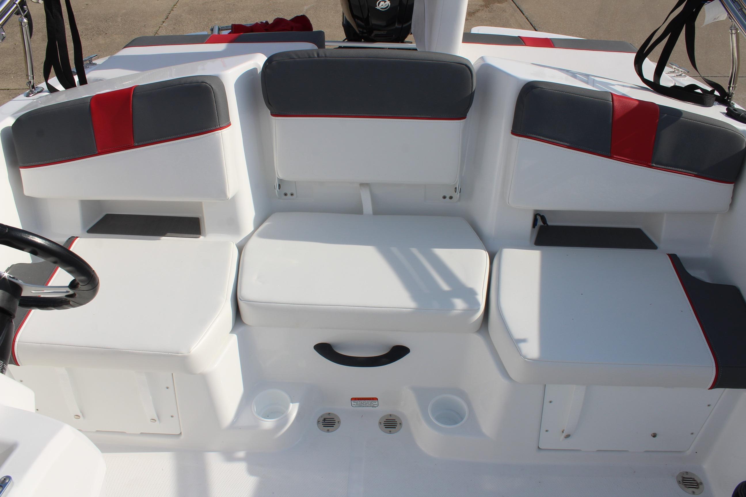 2026 Tahoe T18 boat interior with white and gray seating, accented by red stripes.