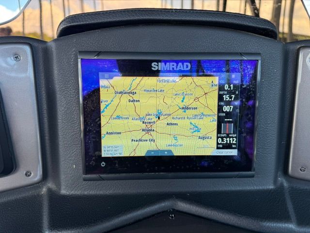 Simrad navigation system in a 2023 Coach Pontoons 263REC boat.