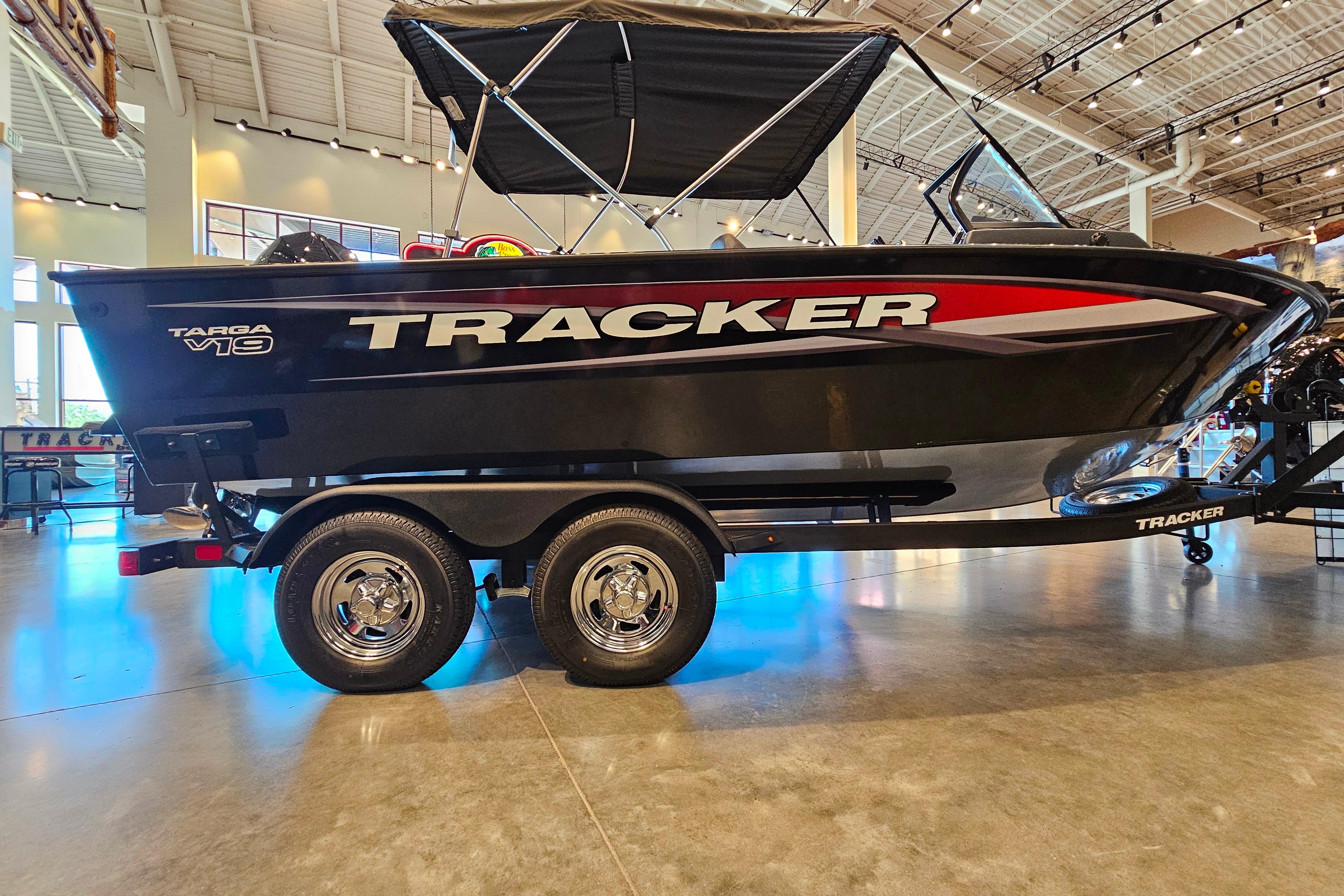 2025 Tracker Targa V-19 WT boat on display in a showroom setting.