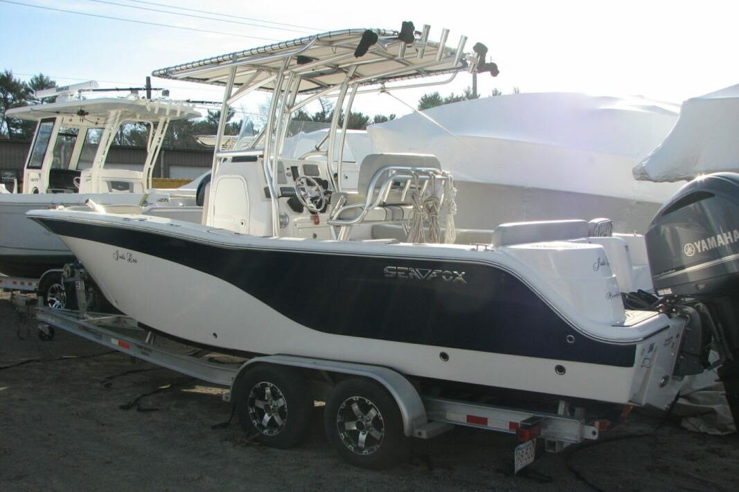 2020 Sea Fox 249 Avenger boat on trailer with Yamaha outboard motor.
