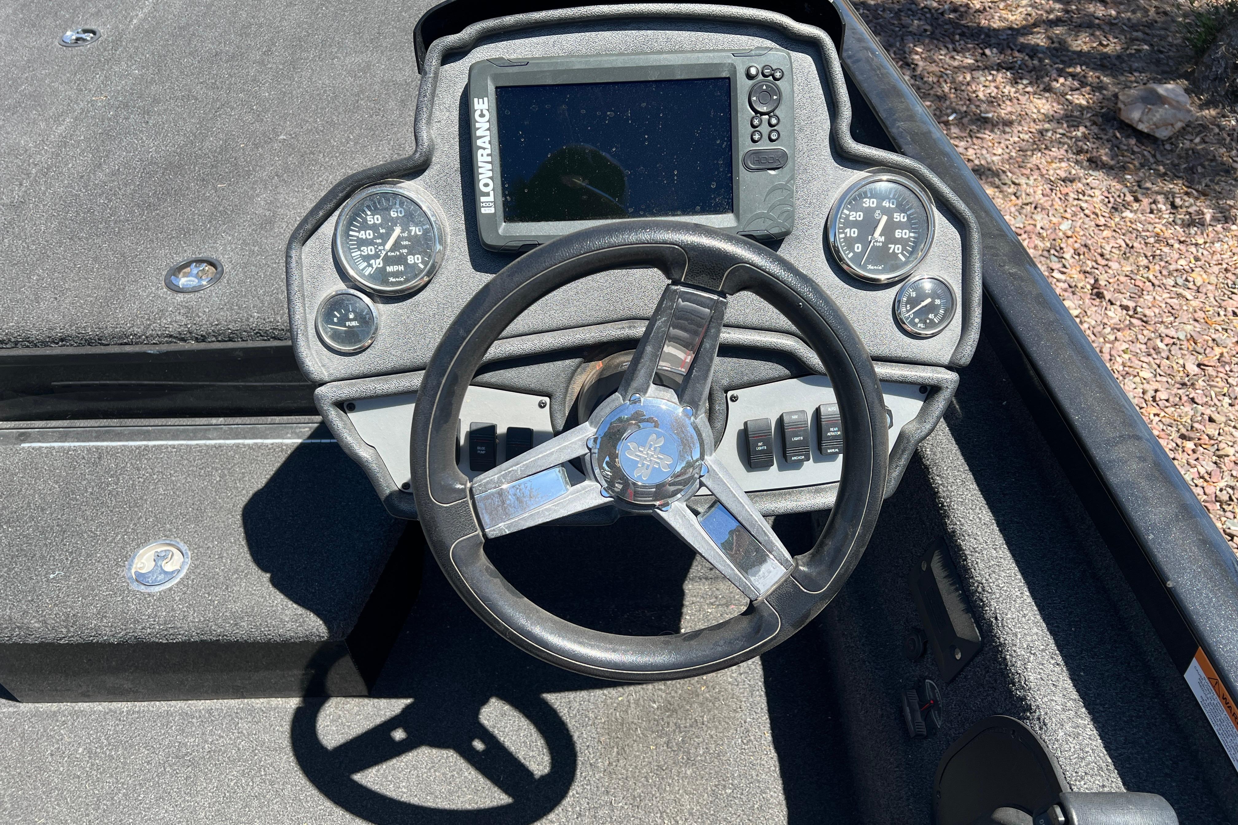 2019 Ranger RT198P boat dashboard with steering wheel and Lowrance display.