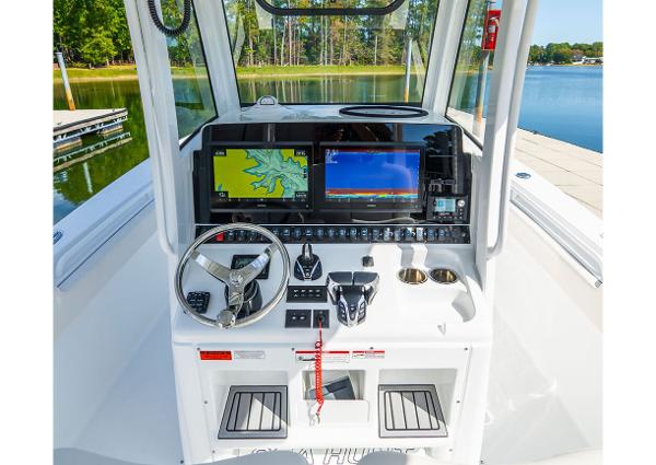 Manufacturer Provided Image: 2026 Sea Hunt Gamefish 28 Coffin Box helm with dual displays and controls, dockside view.