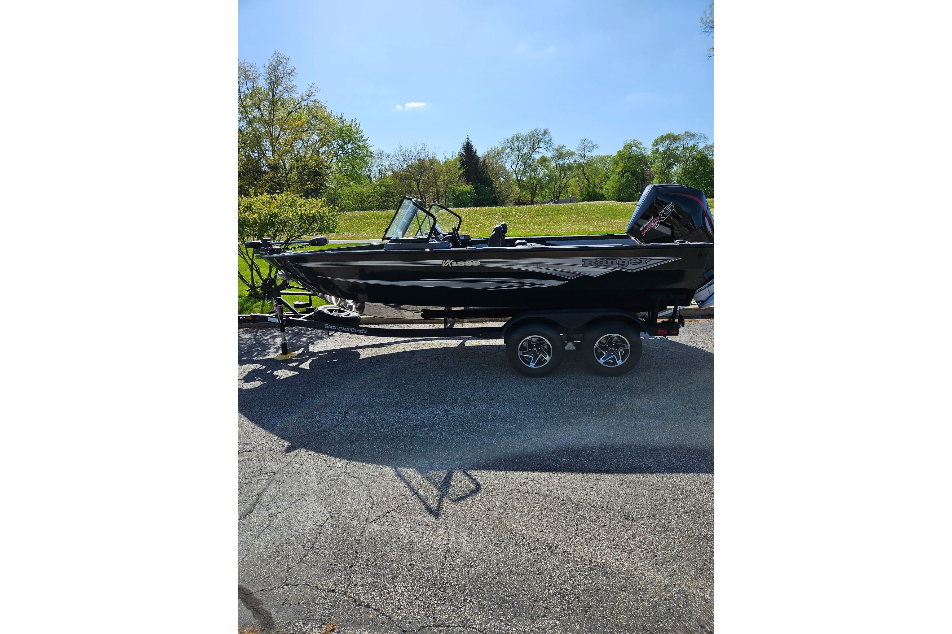 2026 Ranger VX1888 WT boat on trailer, parked outdoors on sunny day.