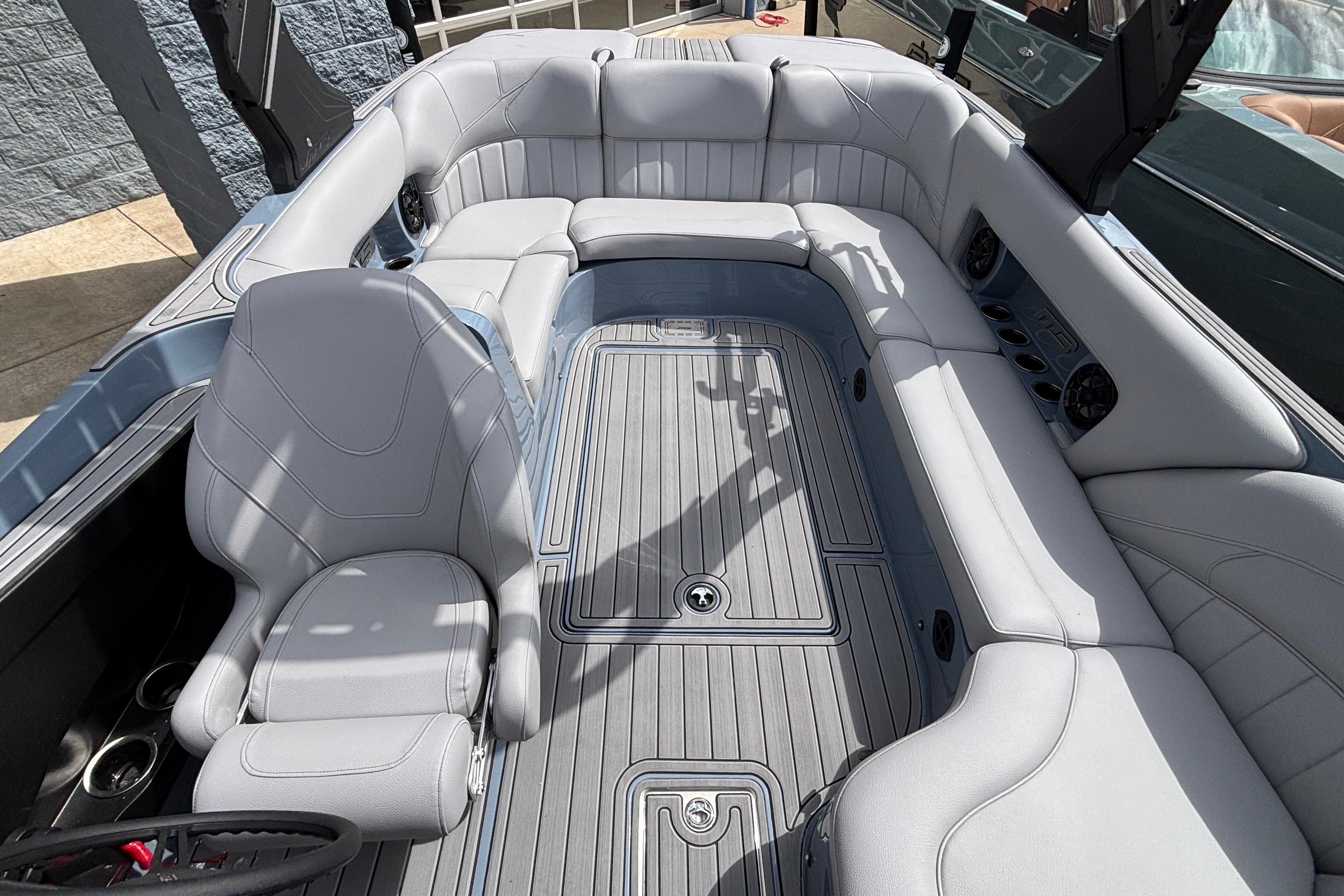 Interior of 2026 MB B52 23 Classic boat with luxurious seating and modern design.