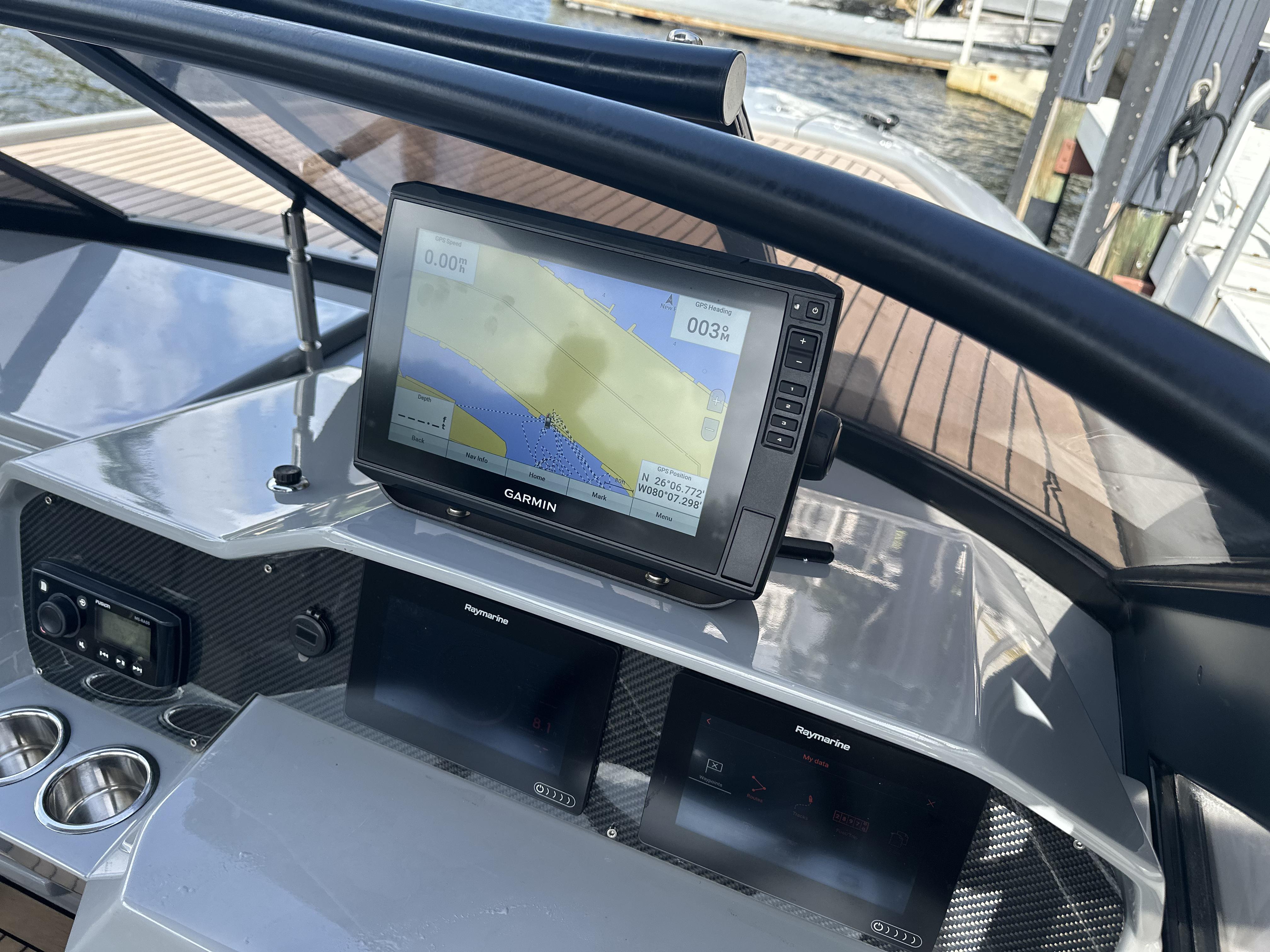 Dashboard of a 2021 Rand Leisure boat featuring a Garmin navigation system.