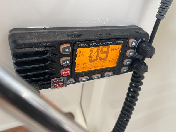 A radio with a lit display shows channel 09.