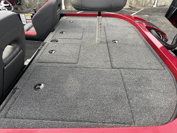 2025 Nitro Z19 boat deck with gray carpet and storage compartments.
