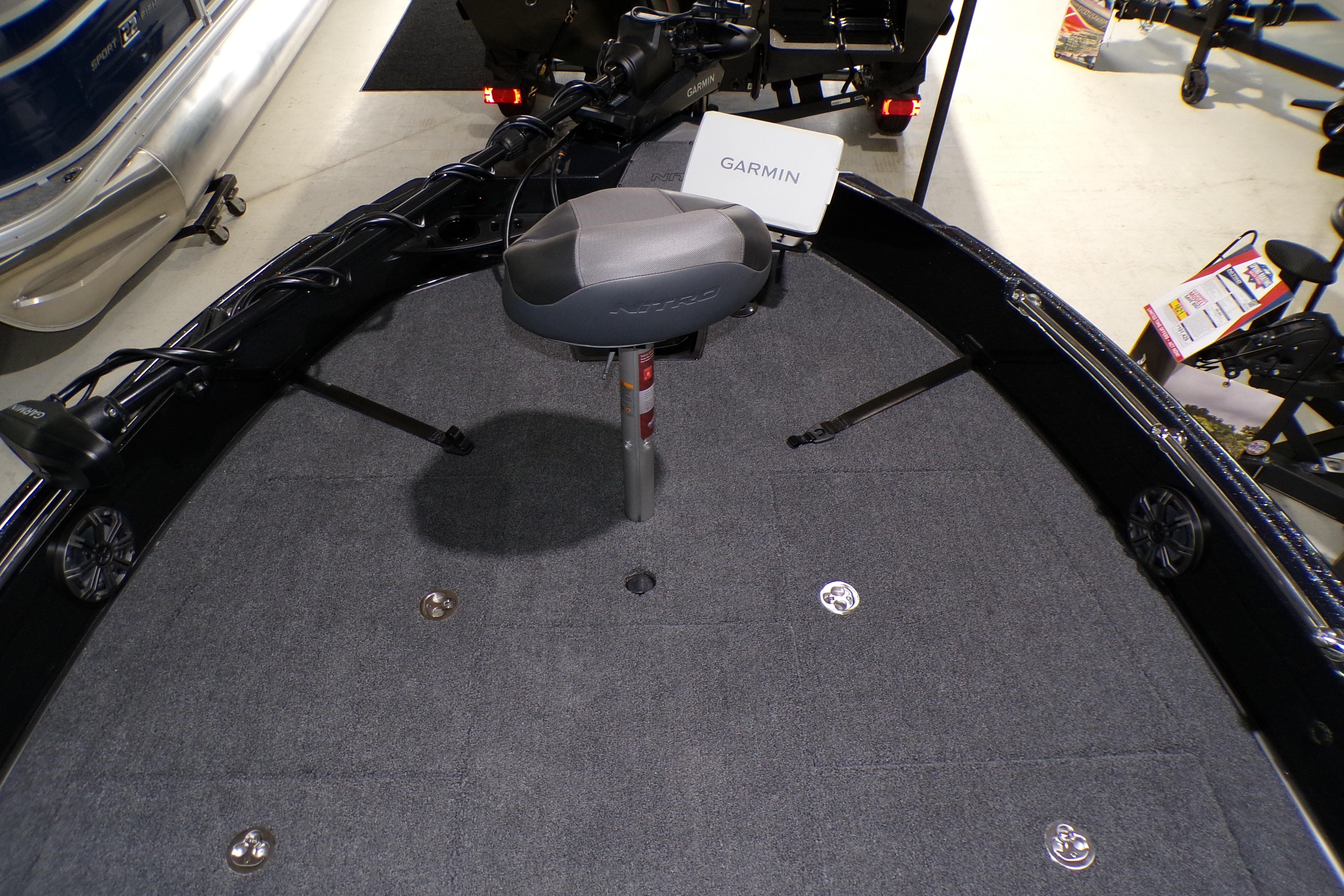 2026 Nitro ZV21 Pro boat interior with Garmin equipment and carpeted deck.