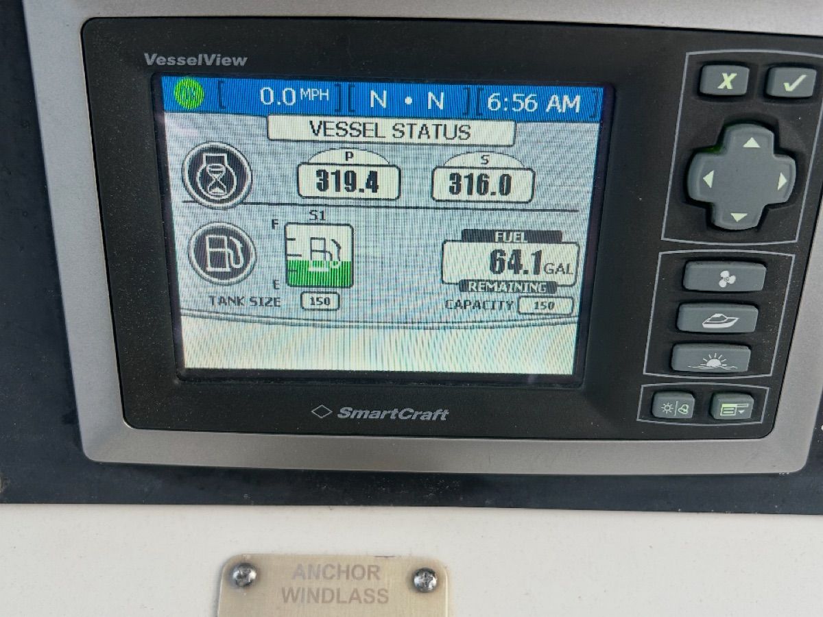 SmartCraft display on Boston Whaler 240 Outrage, showing fuel level and speed.