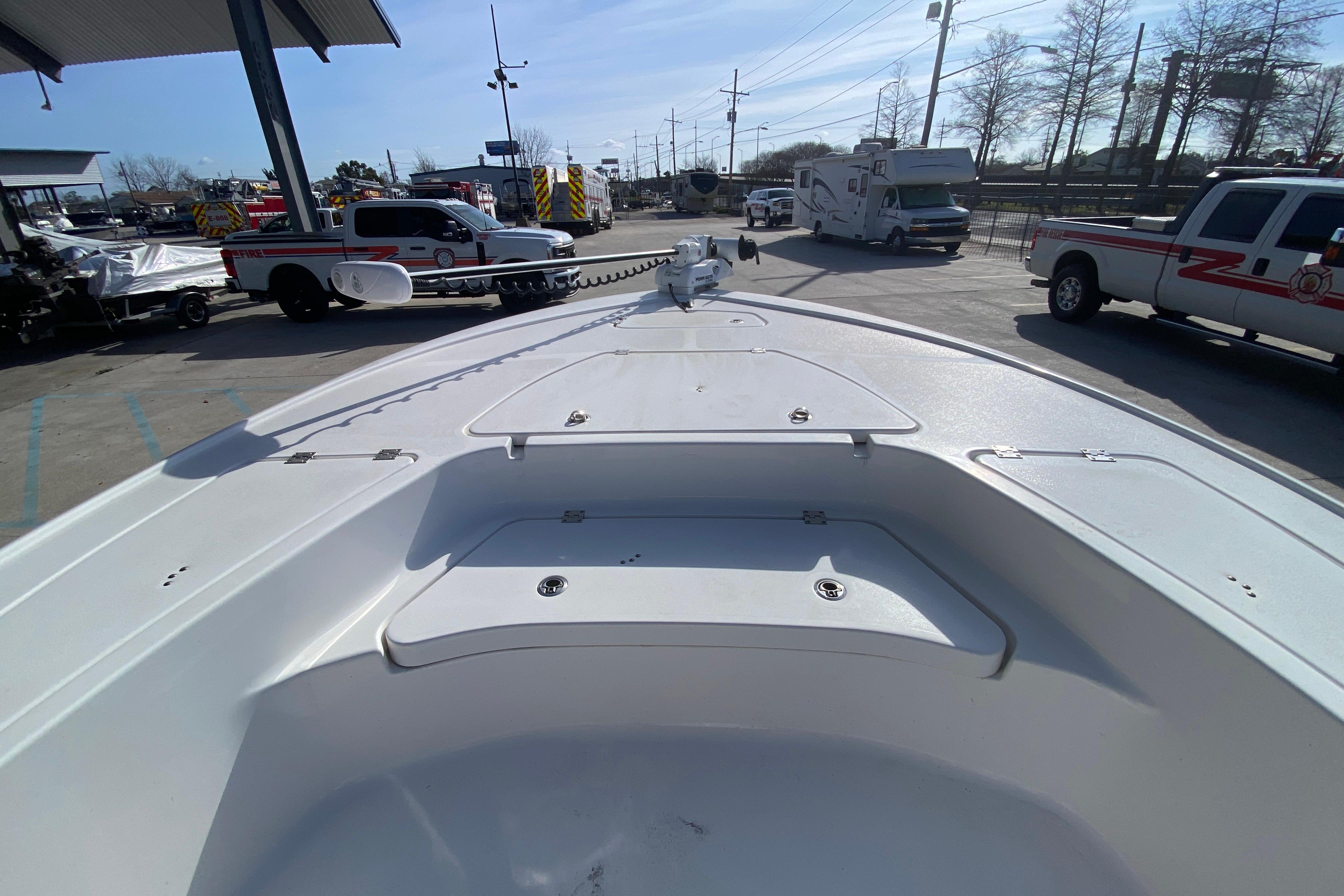 2023 Tidewater 2410 Bay Max boat bow view at a dealership lot.