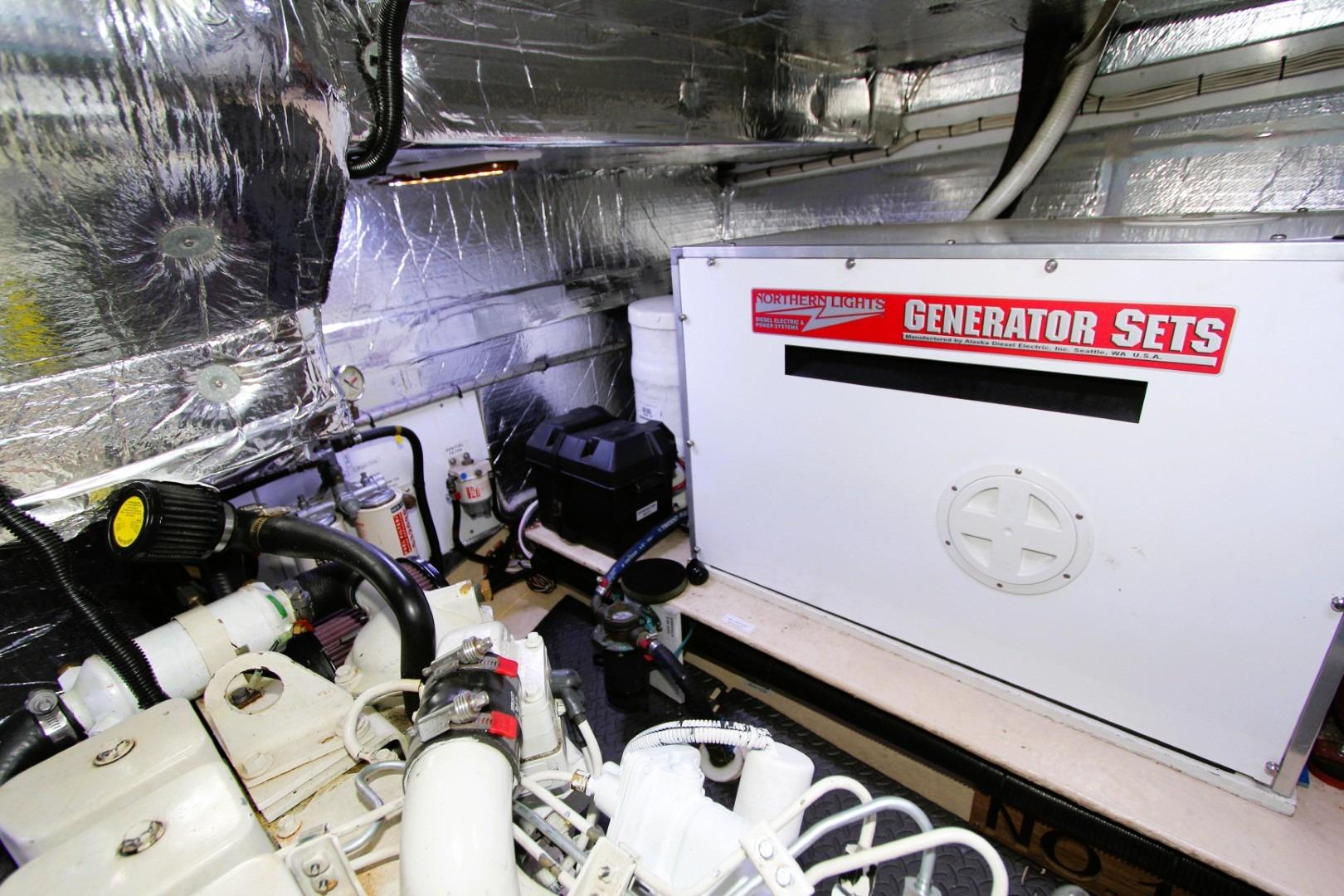 Engine room of 2002 Nordic Tug 37 with Northern Lights generator set.