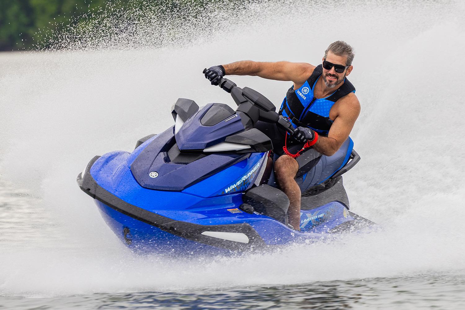 Manufacturer Provided Image: 2026 Yamaha WaveRunner VX Limited HO jet ski speeding on water, rider in blue vest.