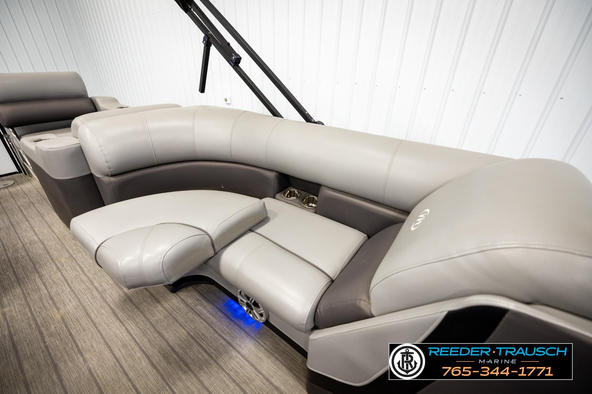 2019 Manitou Oasis SR VP pontoon boat interior with plush seating and modern design.