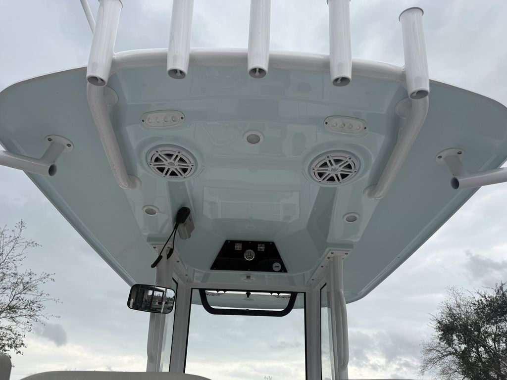 View of a Sportsman Masters 247OE Bay Boat's roof with speakers and mounts.