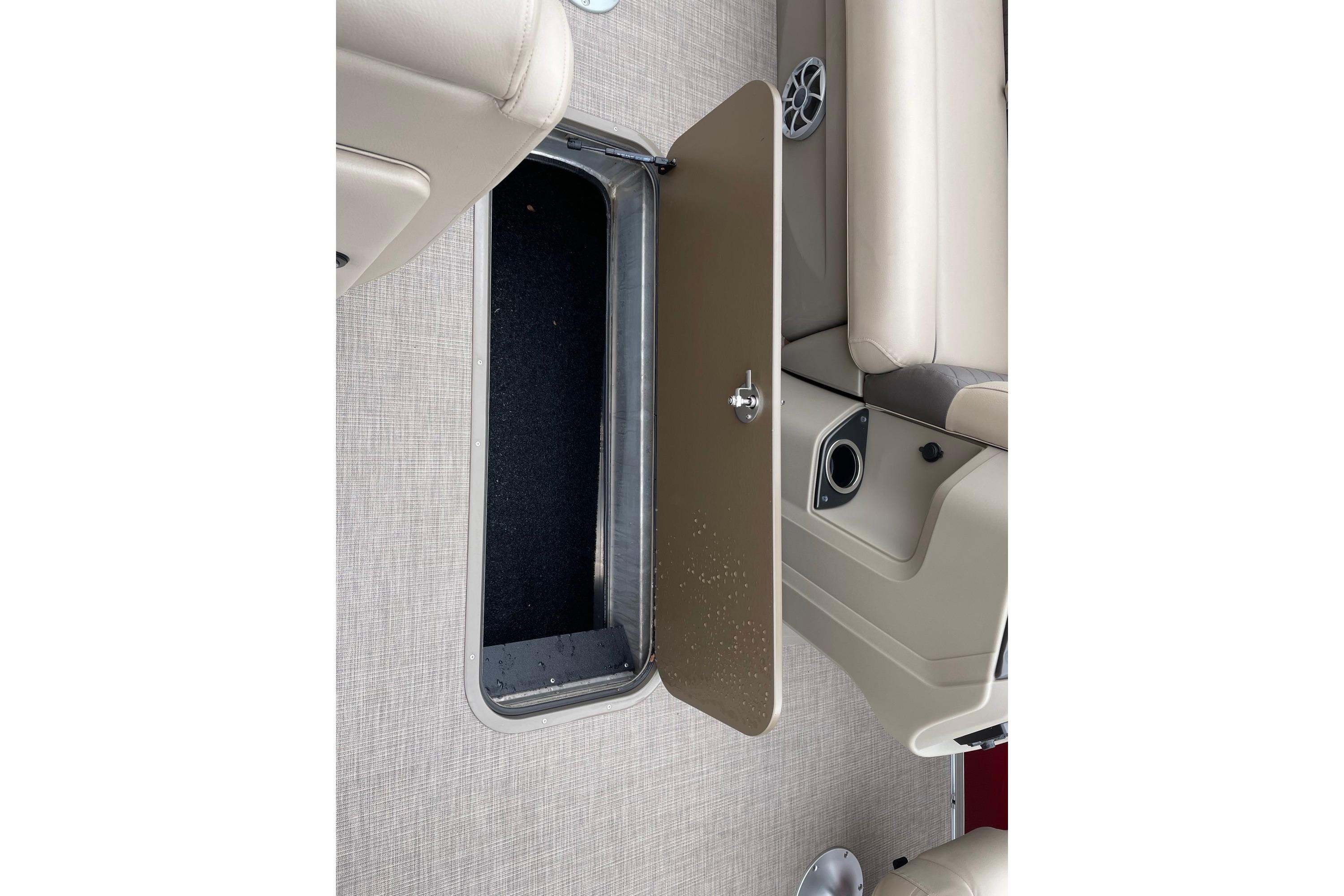Open storage compartment on 2025 Sun Tracker Party Barge 22 XP3 pontoon boat.