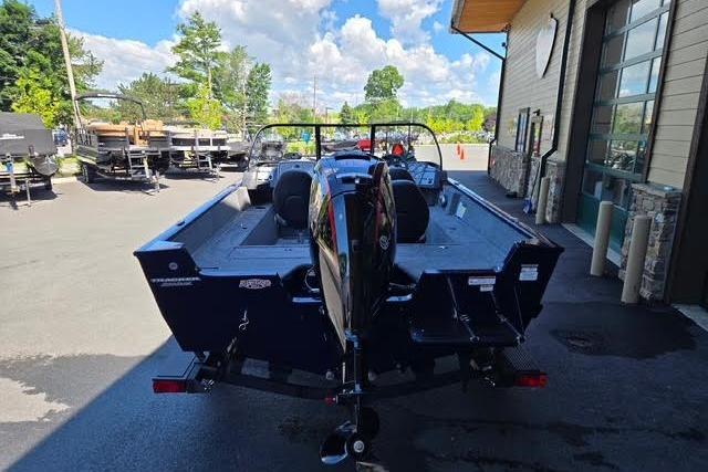 2026 Tracker Pro Guide V-175 WT boat parked outdoors on a sunny day.