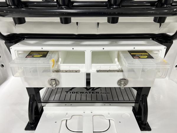 Tidewater 232 CC Adventure 2023 with storage and fishing gear.
