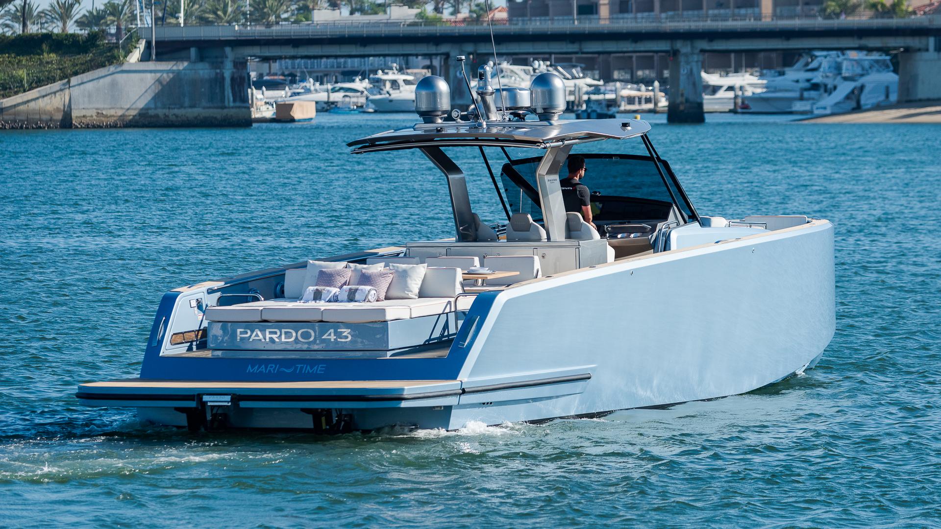 2022 Pardo Yachts 43 cruising in a marina, showcasing sleek design and luxury features.