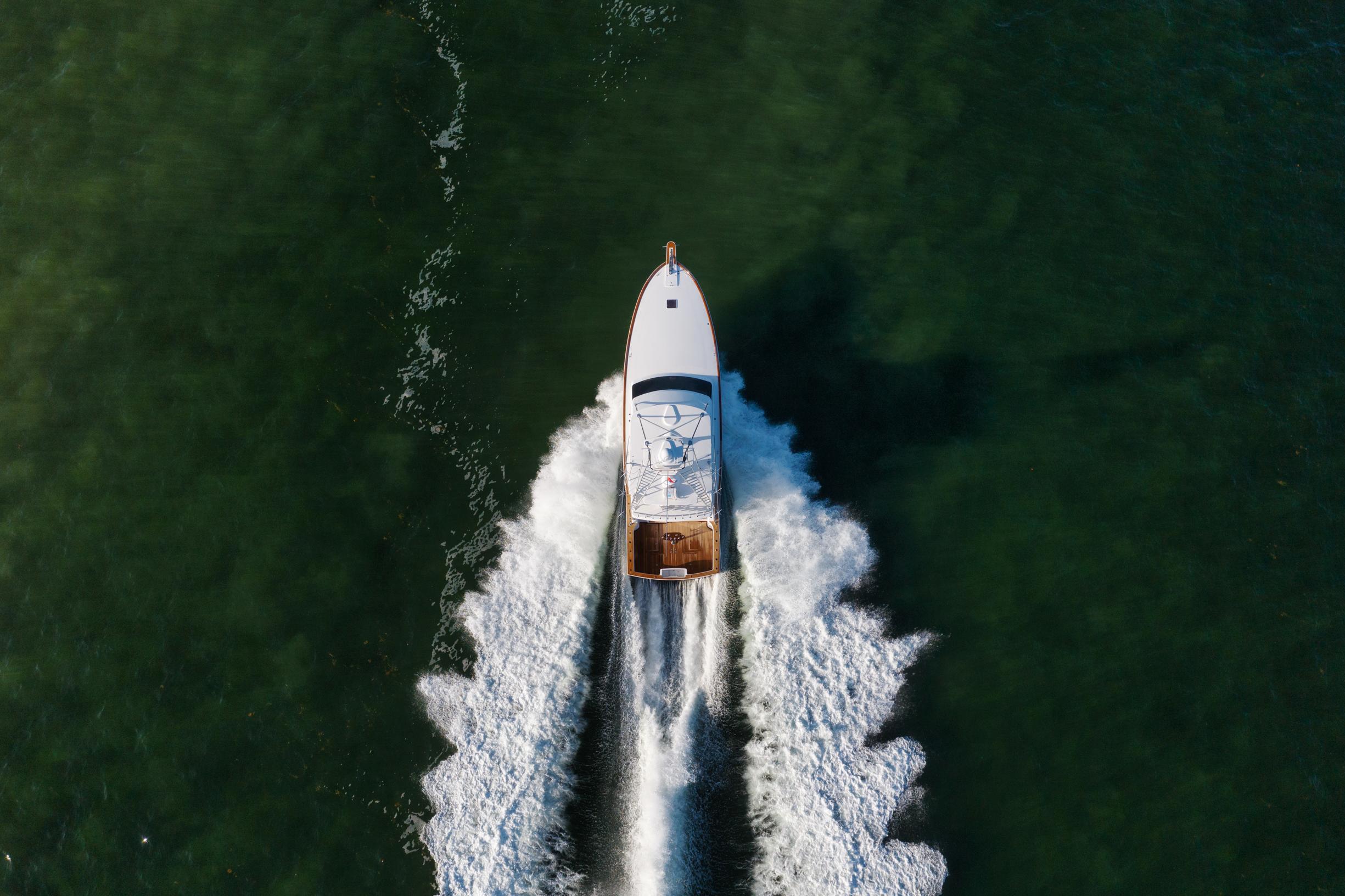 Aerial view of a 1999 Donzi R58 Convertible on the water.